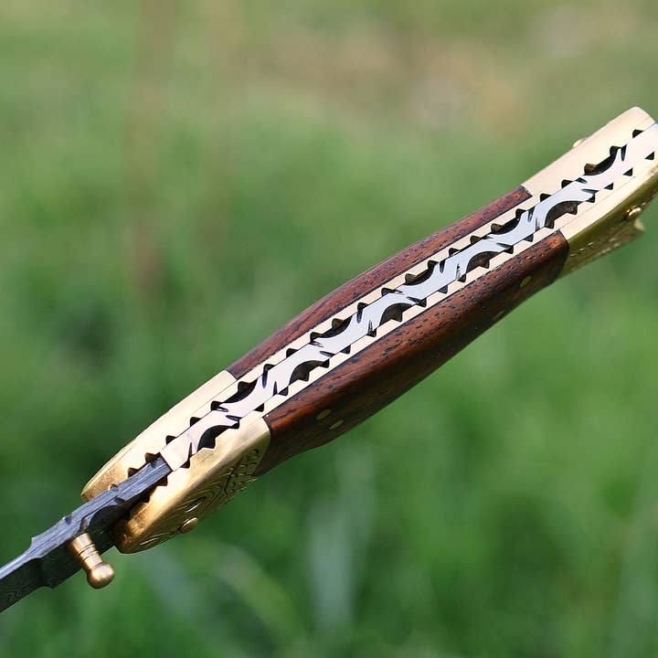 
                      
                        Folding Knife- Fish Shaped w/ leather case
                      
                    